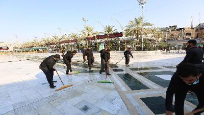 بالصور..حملة تنظيف واسعة لمنطقة ما بين الحرمين الشريفيين تنفذها كوادر العتبة الحسينية